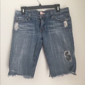 Distressed long denim cut off shorts
